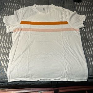 Millie Whitey has orange, striped and pink striped across the chest